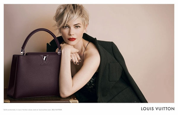 poster advertising Louis Vuitton handbag with Michelle Williams